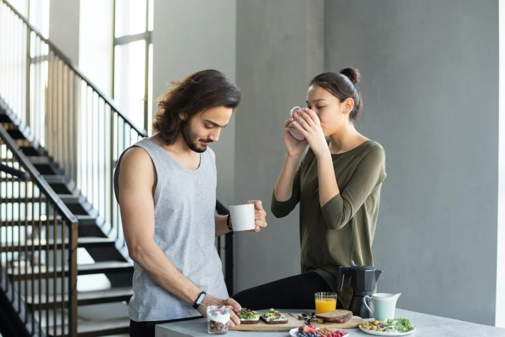 Man and woman having breakfast together